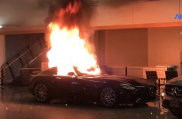 Rioters torch cars in a Mercedes-Benz dealership during protests in the U.S.